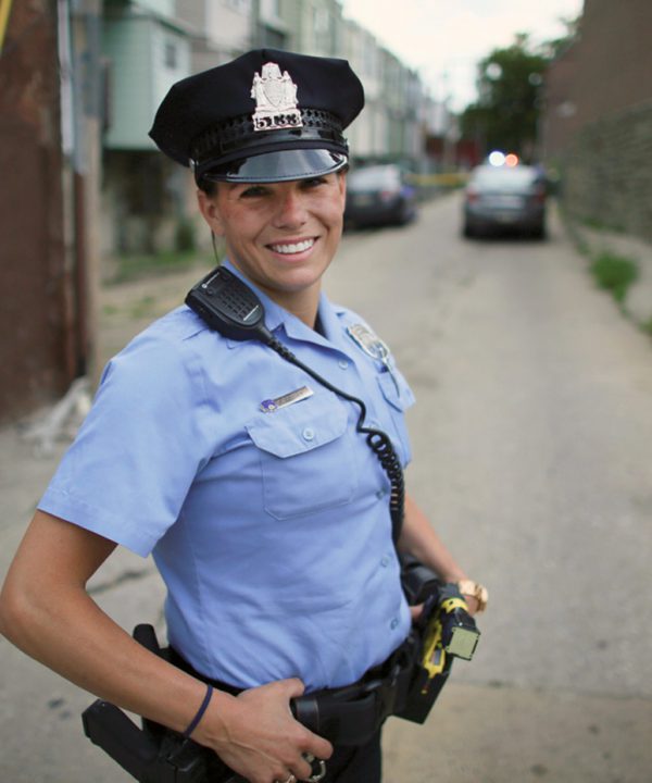 officer smiling on street