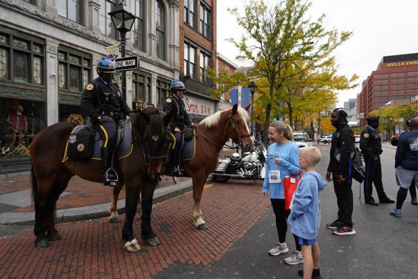Runners participate in the Market Street Run for Blue, Sunday Oct. 23, 2022, in Philadelphia.